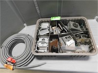 Plastic bin with electrical box face plates, condu
