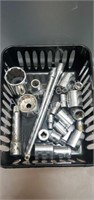 21 assorted sockets, extensions, adapters