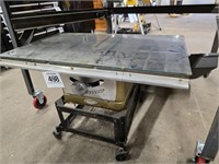 Table saw on rolling stand