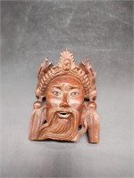 Asian carved face