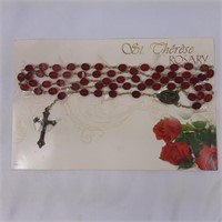 Brand new St. Therese rosary beads and medallion