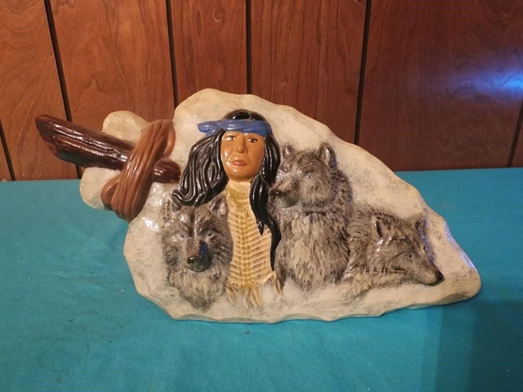 Native American With Wolves On A Arrowhead,