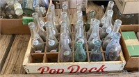 Pop Dock and Old Soda Bottles