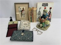 Books wallets and figure in vintage spectacles