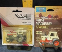 2 small tractors in package