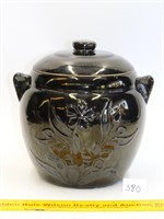 Black flower cookie jar, unmarked (glaze skip in