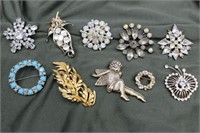 Grouping of 9 Vintage Costume Brooches  + Cupid