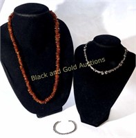 Costume Jewelry: (2) Necklaces & (1) Bracelet