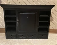 Black wooden cabinet w/ shelves and drawers