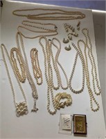 Pretty lot of pearl type jewelry and perfume nips