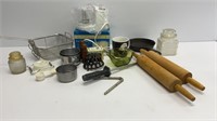 Vintage kitchen items: measuring cups, rolling