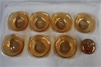 Carnival glass, seven bowls  4.5 X 1.75 and 2.75"