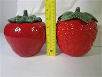 Two small strawberry cookie jars
