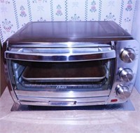 Oster brushed chrome convection toaster oven,