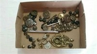 Assorted vintage buttons, pen, and miscellaneous