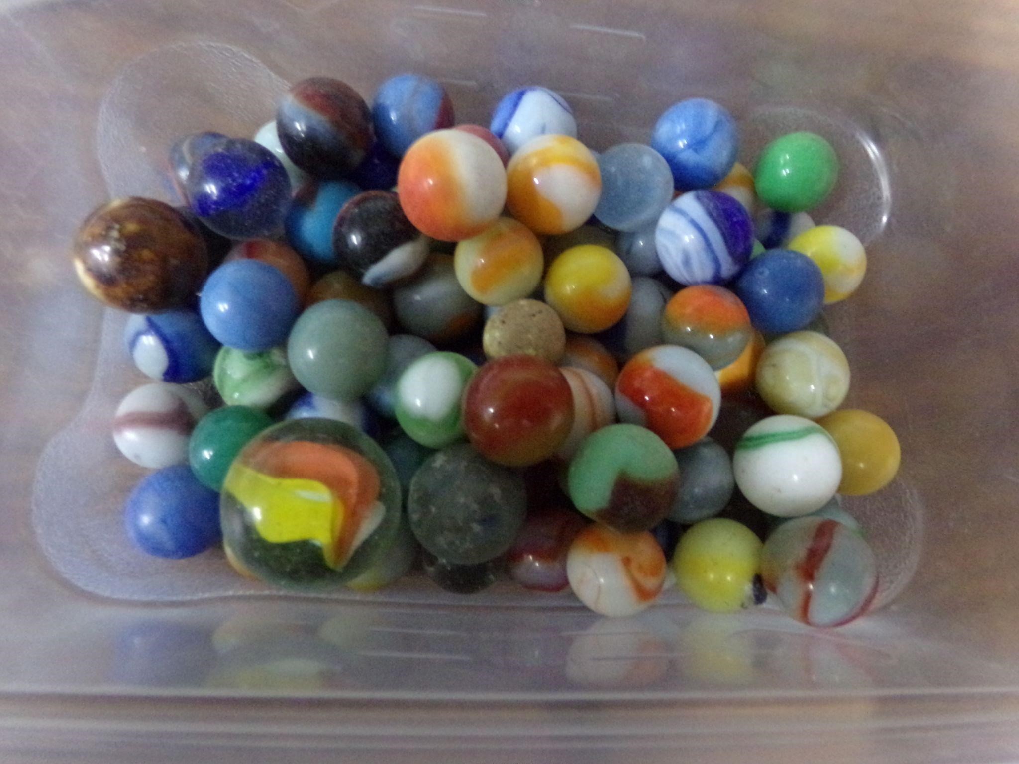 75 old marbles