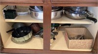 Lot includes contents of two shelves w/ flatware,