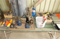 Green Table W/ Oil Cans, Filter Wrenches, Saws