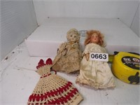 2- small dolls   Descript