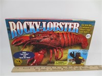 Rocky the singing Lobster, shakes-sings-dances