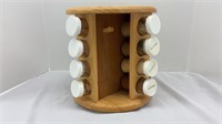 Wooden rotating spice rack with 16 spice jars