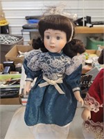 Porcelain doll 17 in