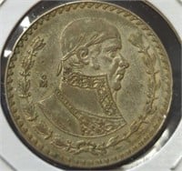 Silver 1957 Mexican dollar