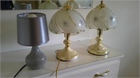 three small lamps