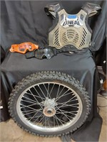 Dirtbike vest, goggles and tire