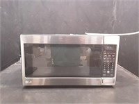 New LG 2.0 cu ft Microwave. No box and minor