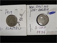 (2) FOREIGN SILVER COINS