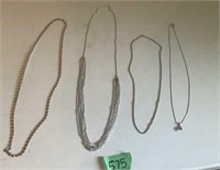 Silver colored necklaces