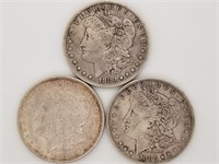 3 Morgan silver dollars: 1880, 1880 S, 1921