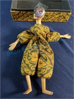 Carved wood doll