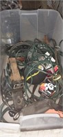 Lot with jumper cables extension cords palm