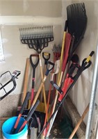 Long handle yard tools in garage