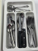 Contents of drawer, silverware, and drawer divider