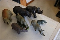 7 rhino figurines
