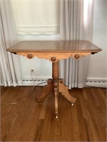 Antique swivel top table
