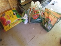 3 full bags of potting mix & partial bags