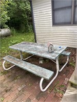 Metal picnic table needs painted, otherwise good