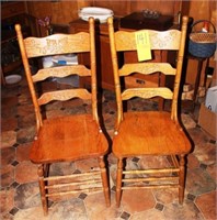 2 matching oak dining chairs with