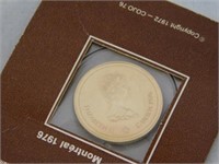 1976 Olympic gold $100 coin, (14K, 13.3375 gm) in