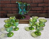 Carnival glass pitcher with 8 glasses