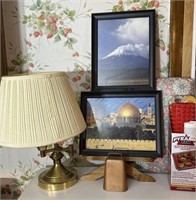 Grouping of pictures cowbell and lamp