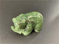 Alaskan Kobuk jade carved large bear who has caugh