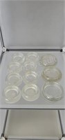 11 assorted glass furniture leg discs