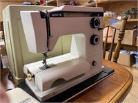 White Sewing Machine in Carrying Case