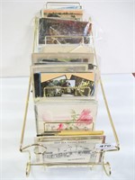 Lot: postcards and display rack