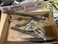 assorted tools including wrenches